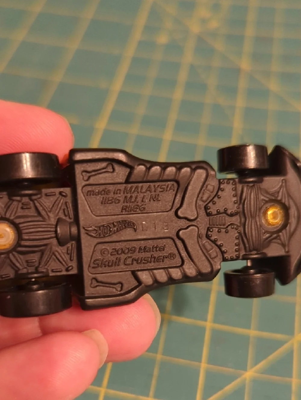 2009 Hot Wheels Skull Crusher with Red Wheels
